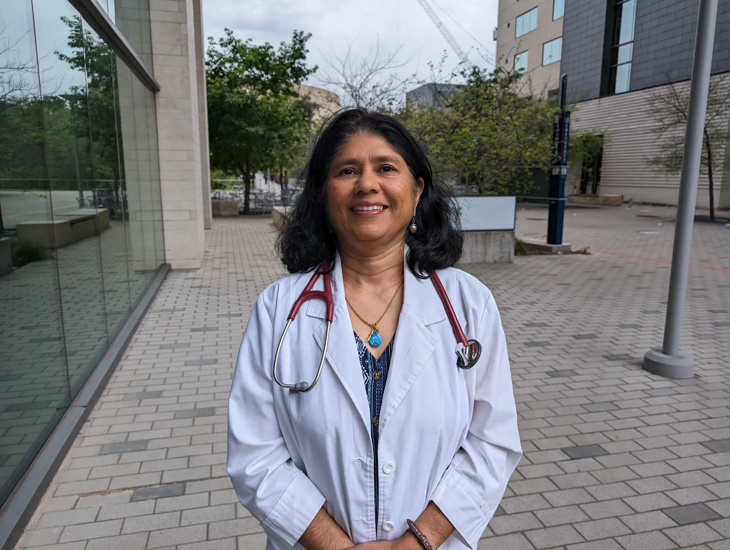 Tessy Kadavil, DNP, FNP outside the practice on Wurzbach Road, San Antonio